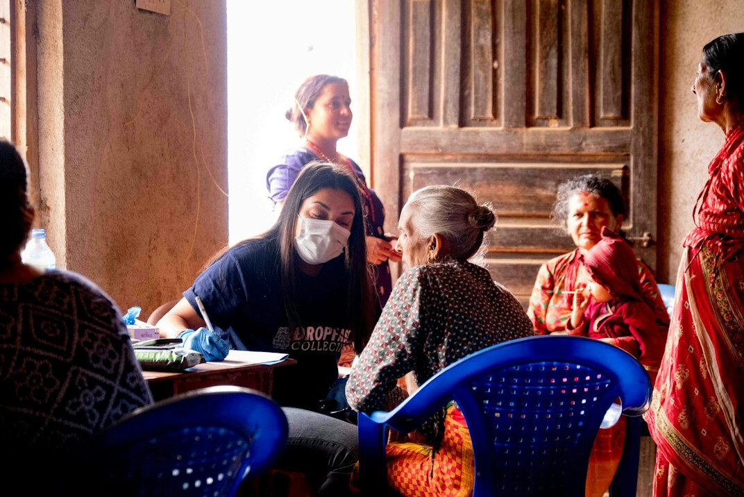 Participants seated around a table during a workshop session